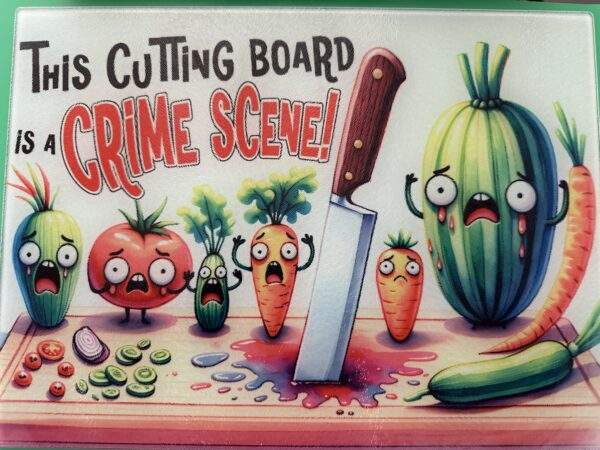 A glass cutting board with several cartoonish horrified vegetables around a knife driven through a splattered tomato. Text reads, "This cutting board is a crime scene!"