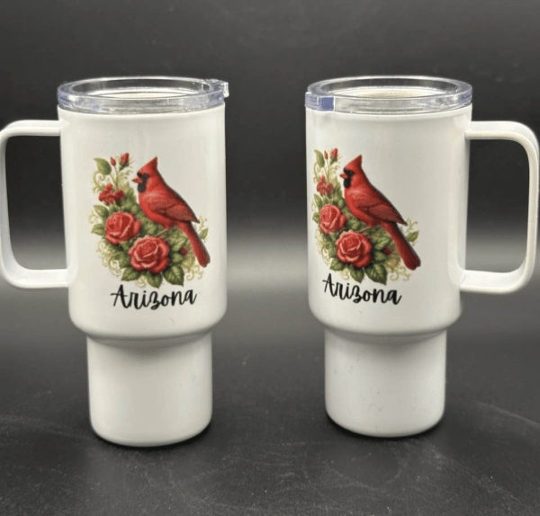 A set of mini tumblers with the design of a red cardinal and flowers over the word "Arizona."