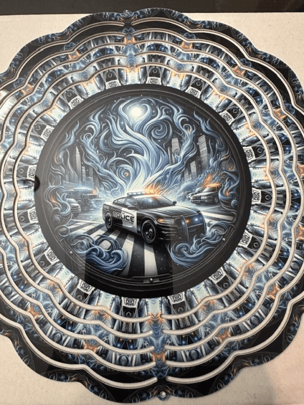 A dramatic black, gray, and blue scene of a police car at night surrounded by smoke, sitting beneath a full moon.