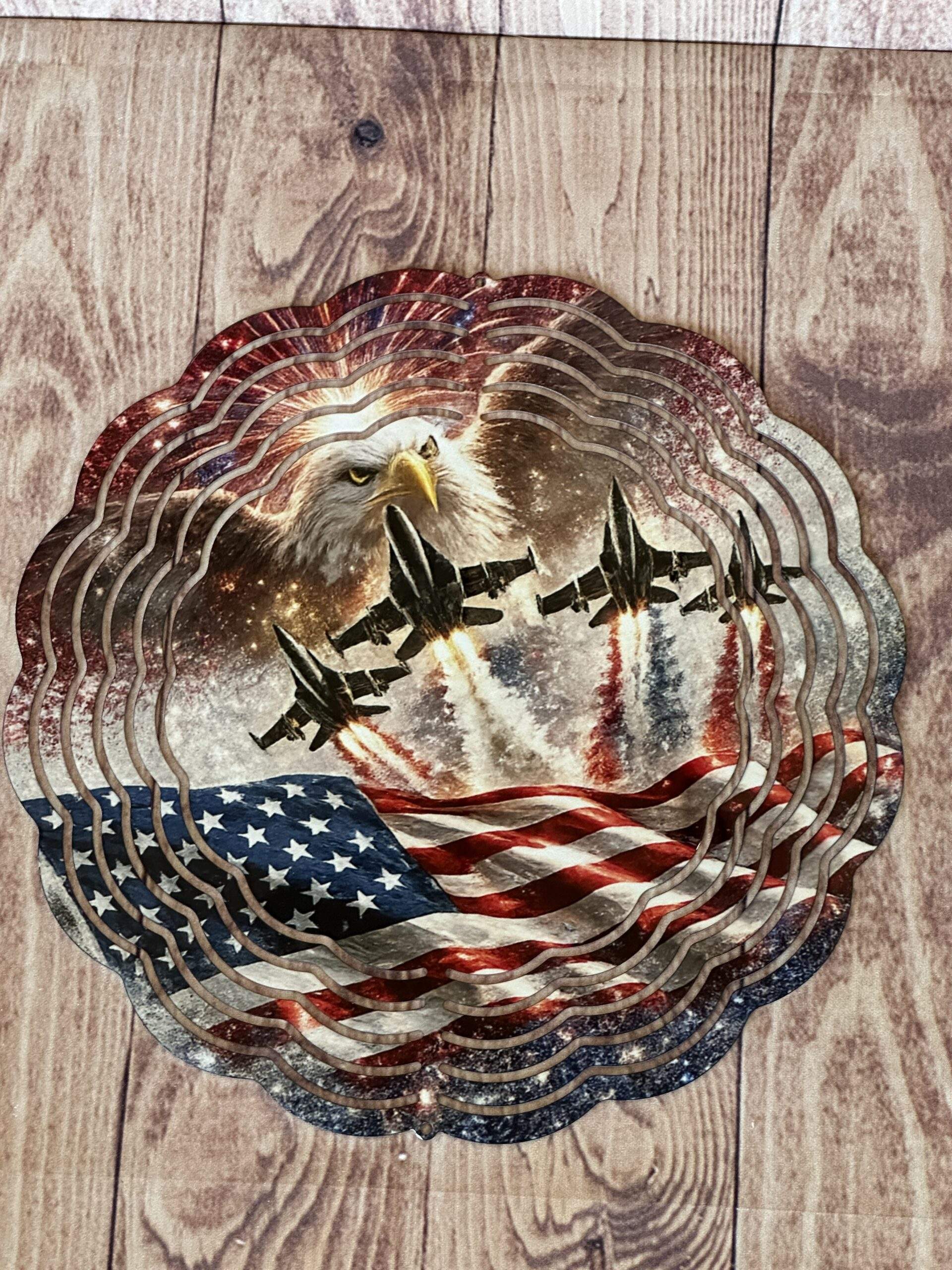 Windspinner: Patriotic Bald Eagle watching over the jets